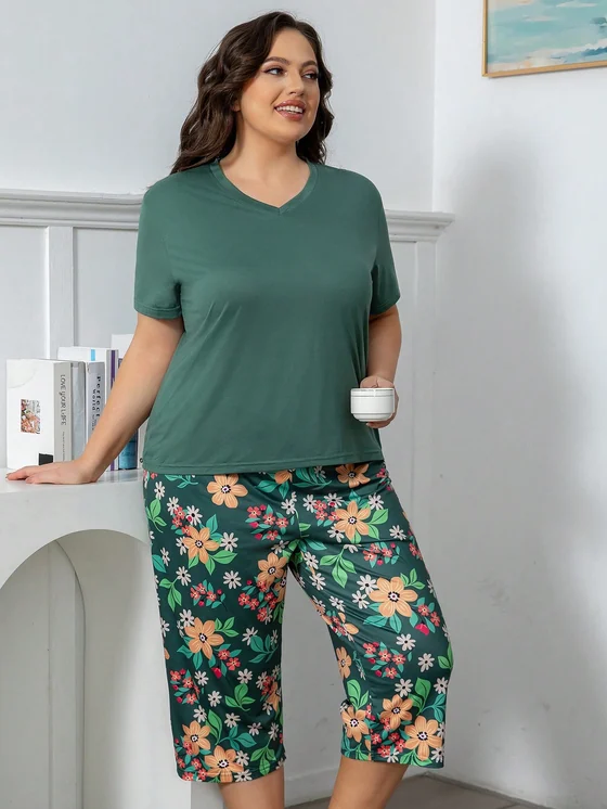 Dark green short-sleeve top with floral-print capri bottoms