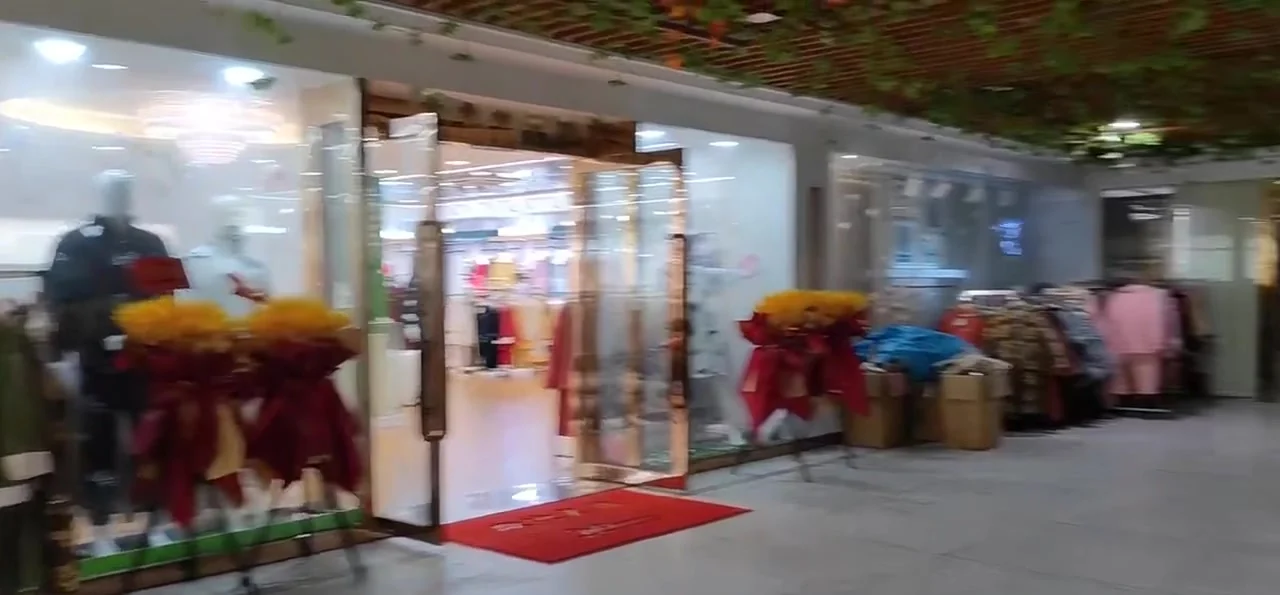 Sample garments arranged in the Rushiman factory showroom
