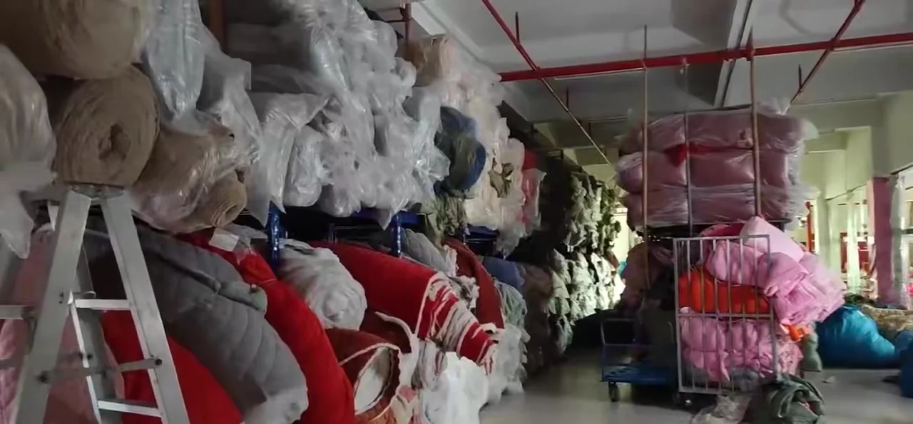 Fabric rolls stored inside the Rushiman factory